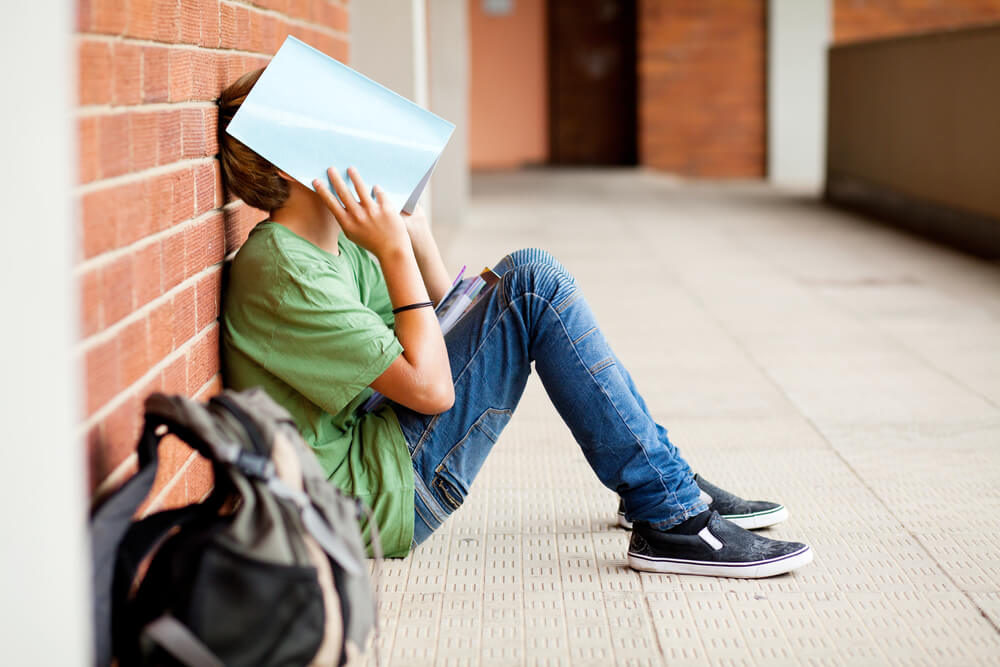 6 Reasons Why Your Teen Hates School (And What To Do About It)